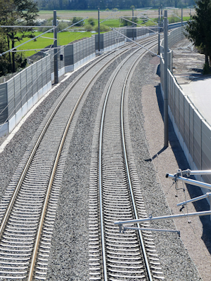 Rail track noise barrier